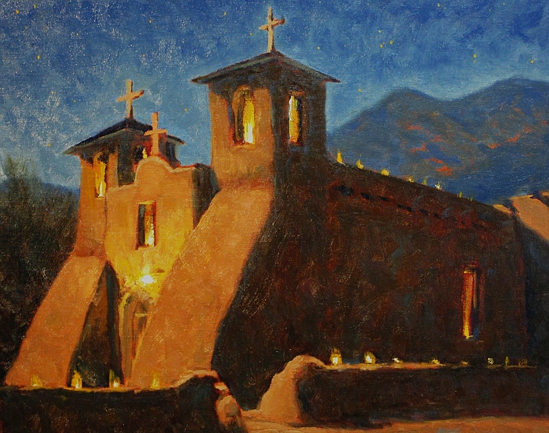 Night scene of a church with two bell towers, illuminated windows, and a cross on top, against a dark sky with mountains.