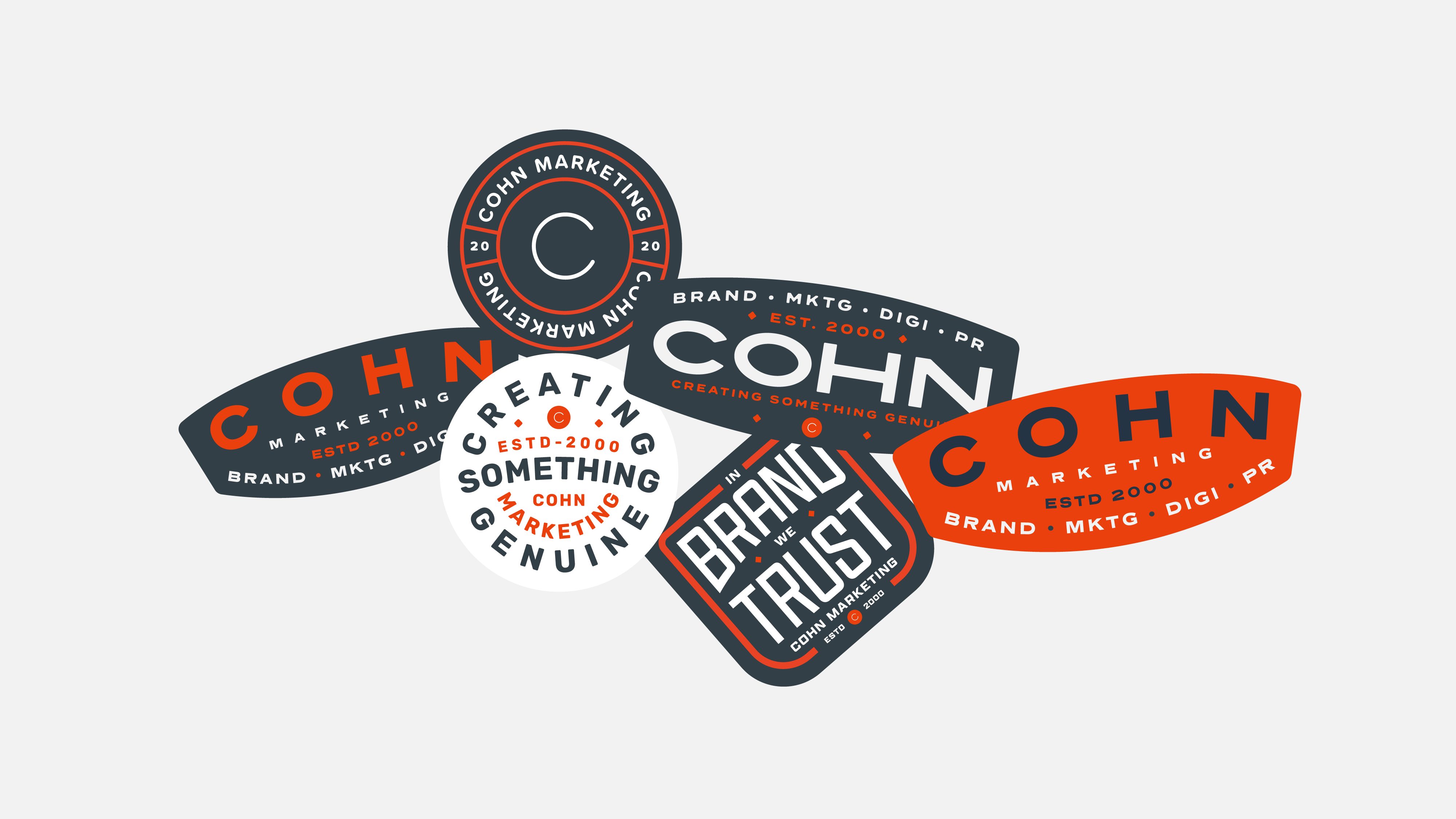 Collection of stickers with logos and text, including 'COHN', 'BRANDING', and 'CREATING SOMETHING GENUINE', on a white background.