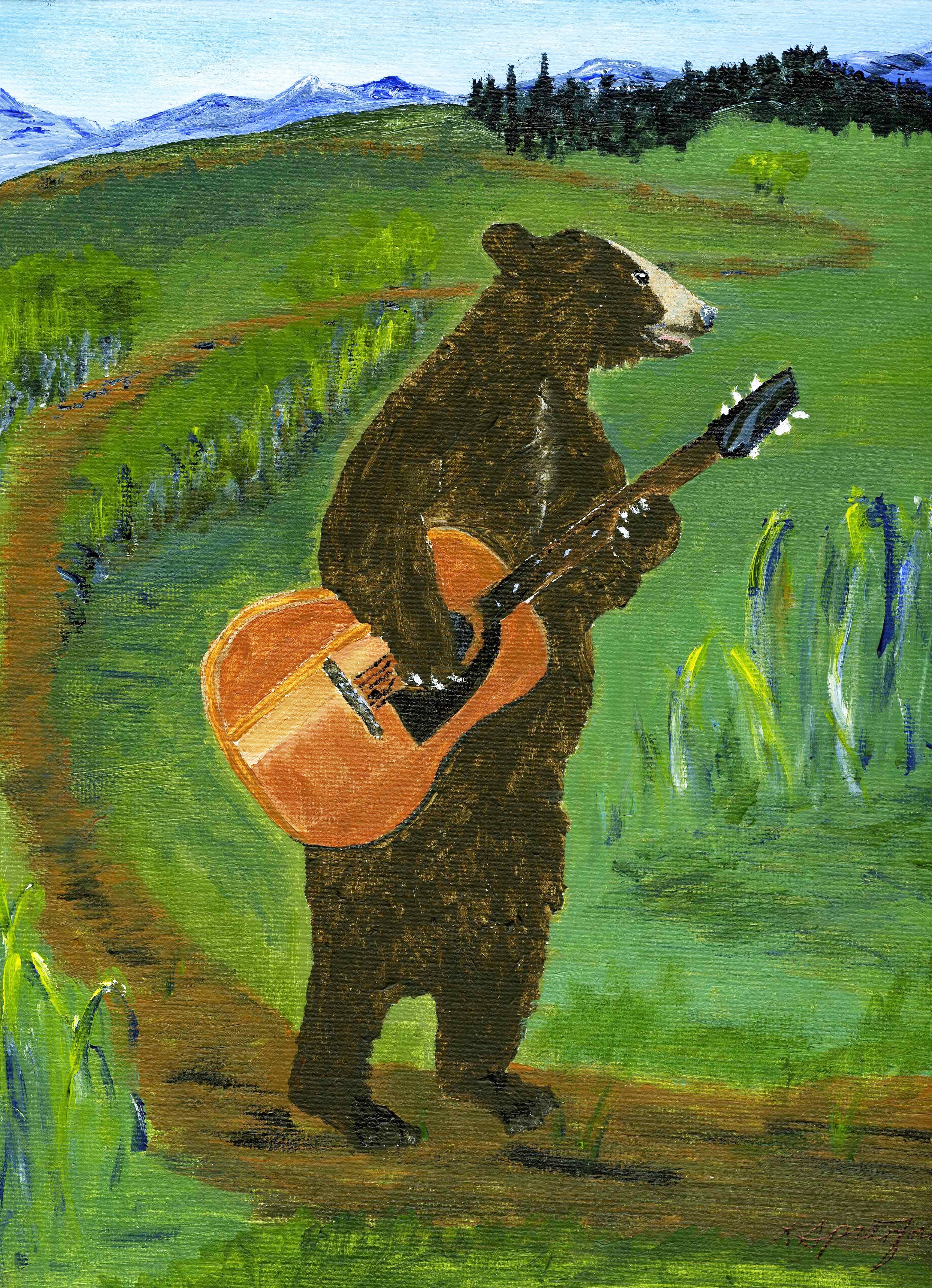 A bear standing on a path in a green landscape, holding a guitar and a small object, with mountains in the background.