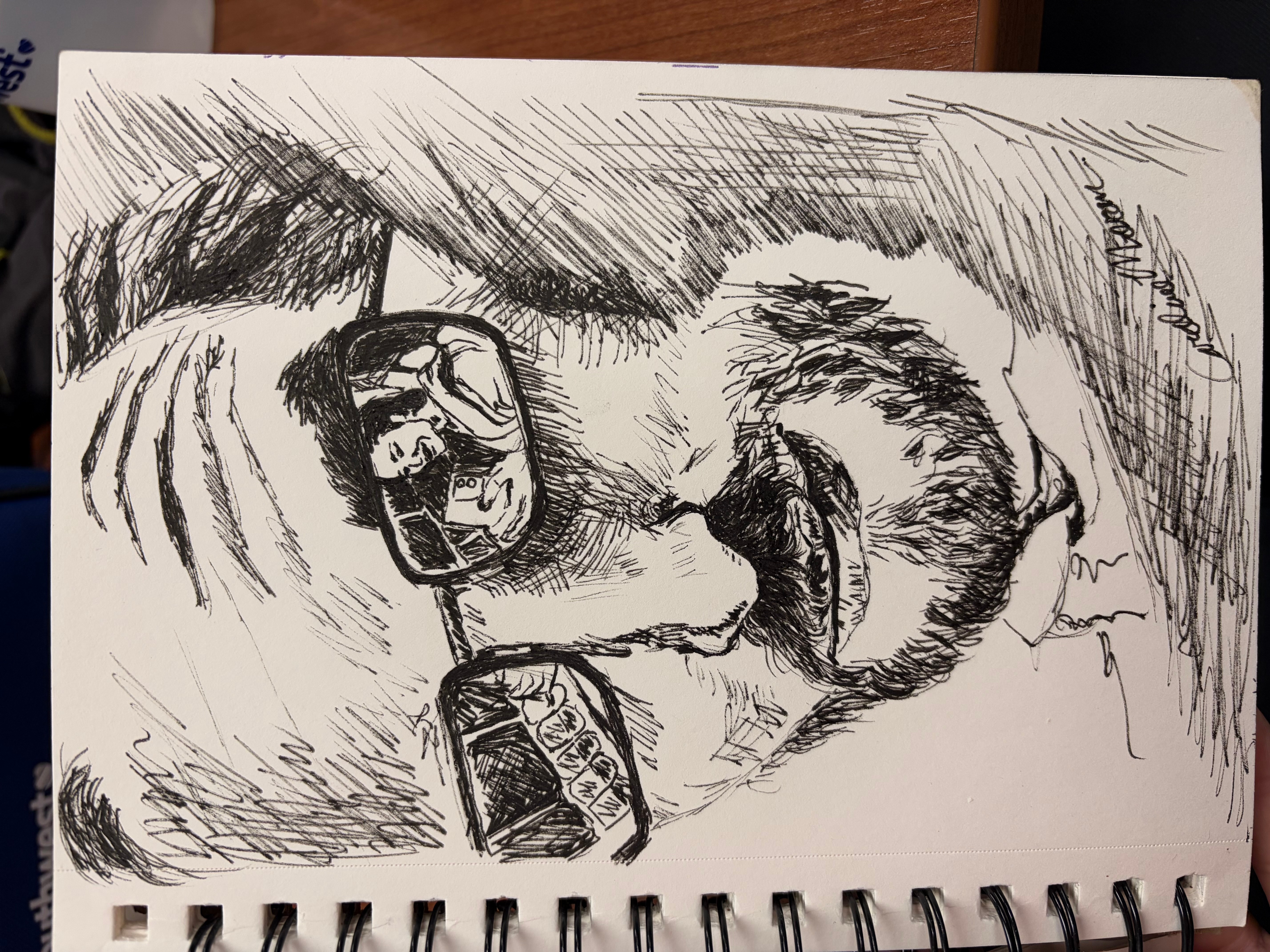 Sketch of a person lying down with a phone, surrounded by abstract lines and shading, in a spiral-bound sketchbook.