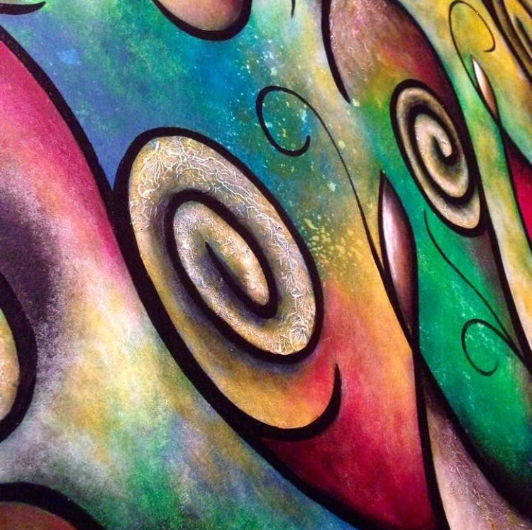Colorful abstract painting with spirals, swirls, and vibrant hues blending together.