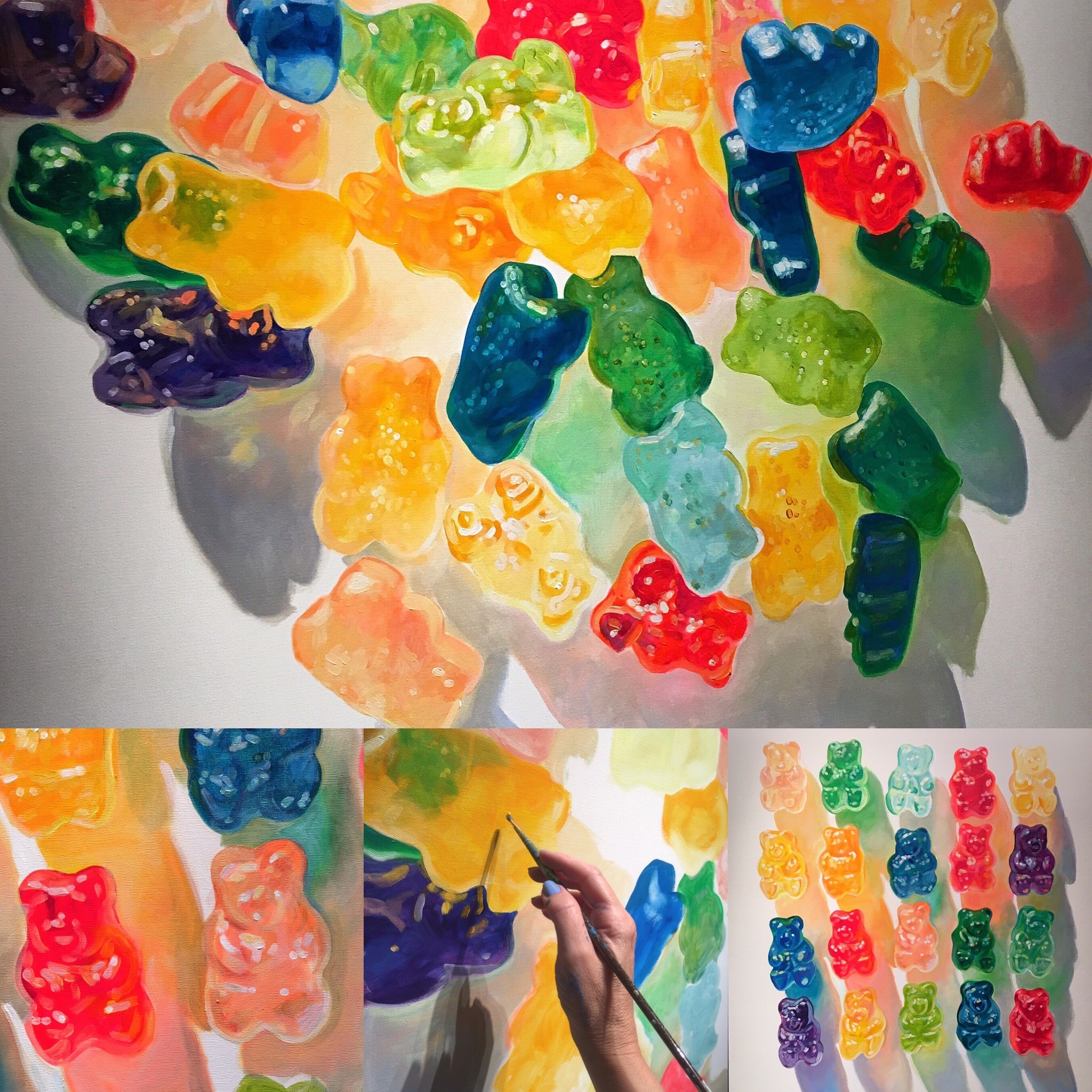 Colorful gummy bears scattered on a white surface with a hand holding a paintbrush nearby.