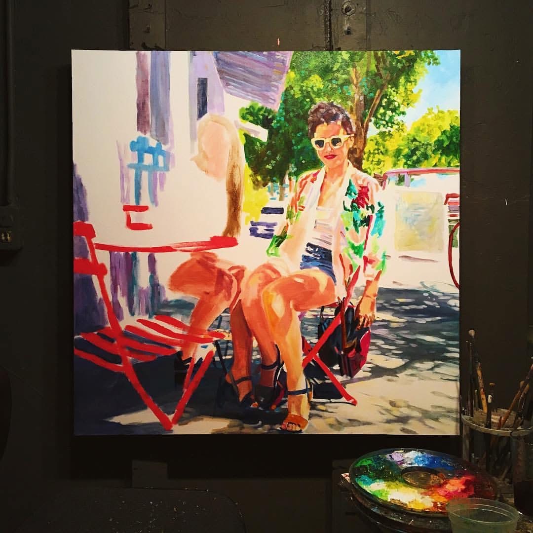 Woman with sunglasses sitting on a red chair outdoors, with trees and buildings in the background, painted in vibrant colors.